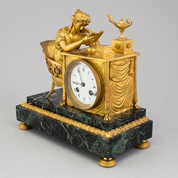 A gilt bronze Empire mantle clock, first half of the 19th Century.