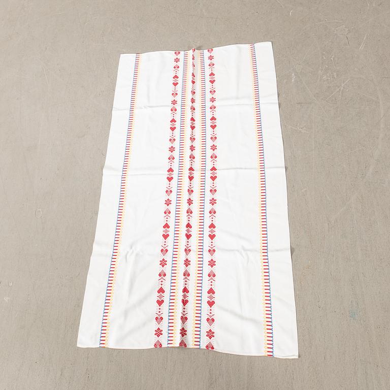 A collection of Christmas tablecloths 12 pcs first half/mid 20th century.