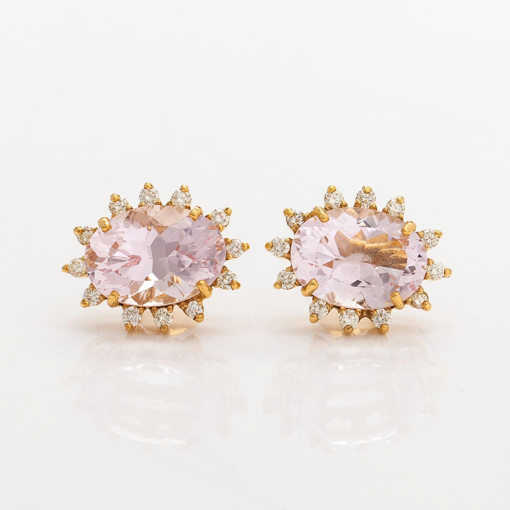 A pair of 14K gold earrings with faceted morganites and brilliant-cut diamonds.