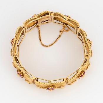 18K gold and ruby bracelet.