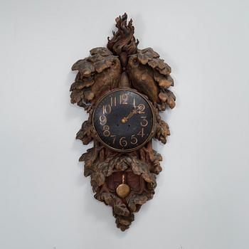 A wall clock by CARL CHRISTIAN CHRISTENSEN, signed and dated 1905.