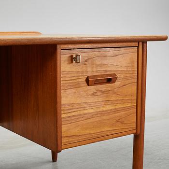 A 1950/60's teak writing desk.