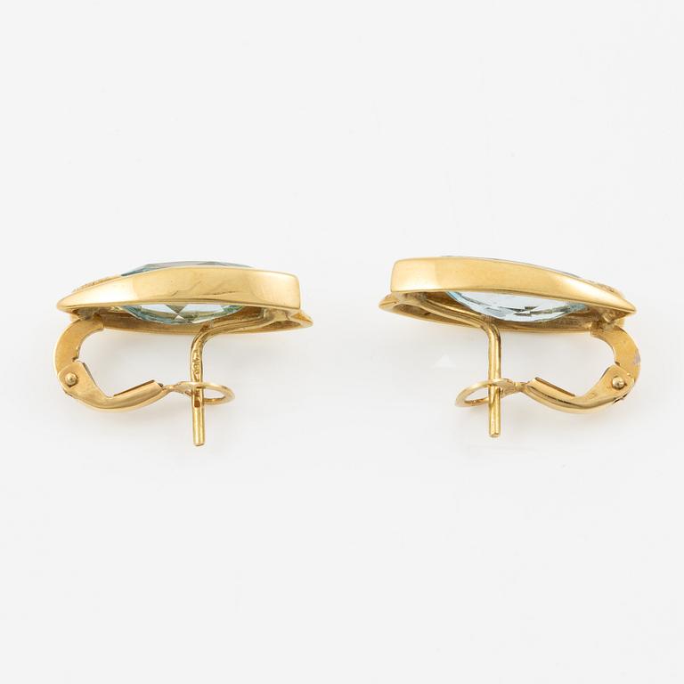 Earrings, 18K gold set with navette-cut blue topazes.