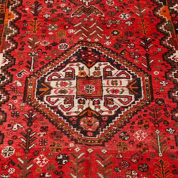 A rug, Shiraz, ca 292 x 115 cm.