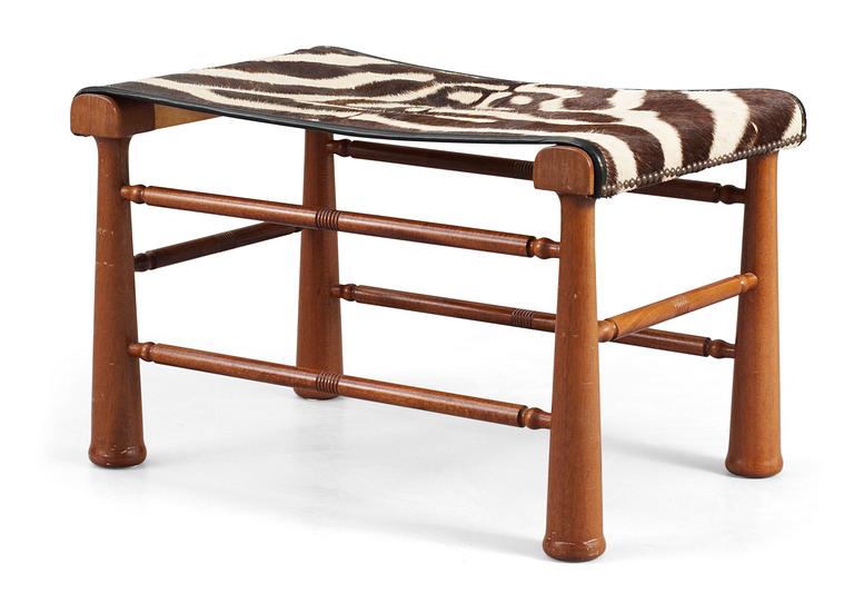 A Josef Frank mahogany stool, Svenskt Tenn, model 972.