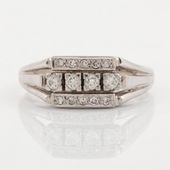 18K gold ring with diamonds.