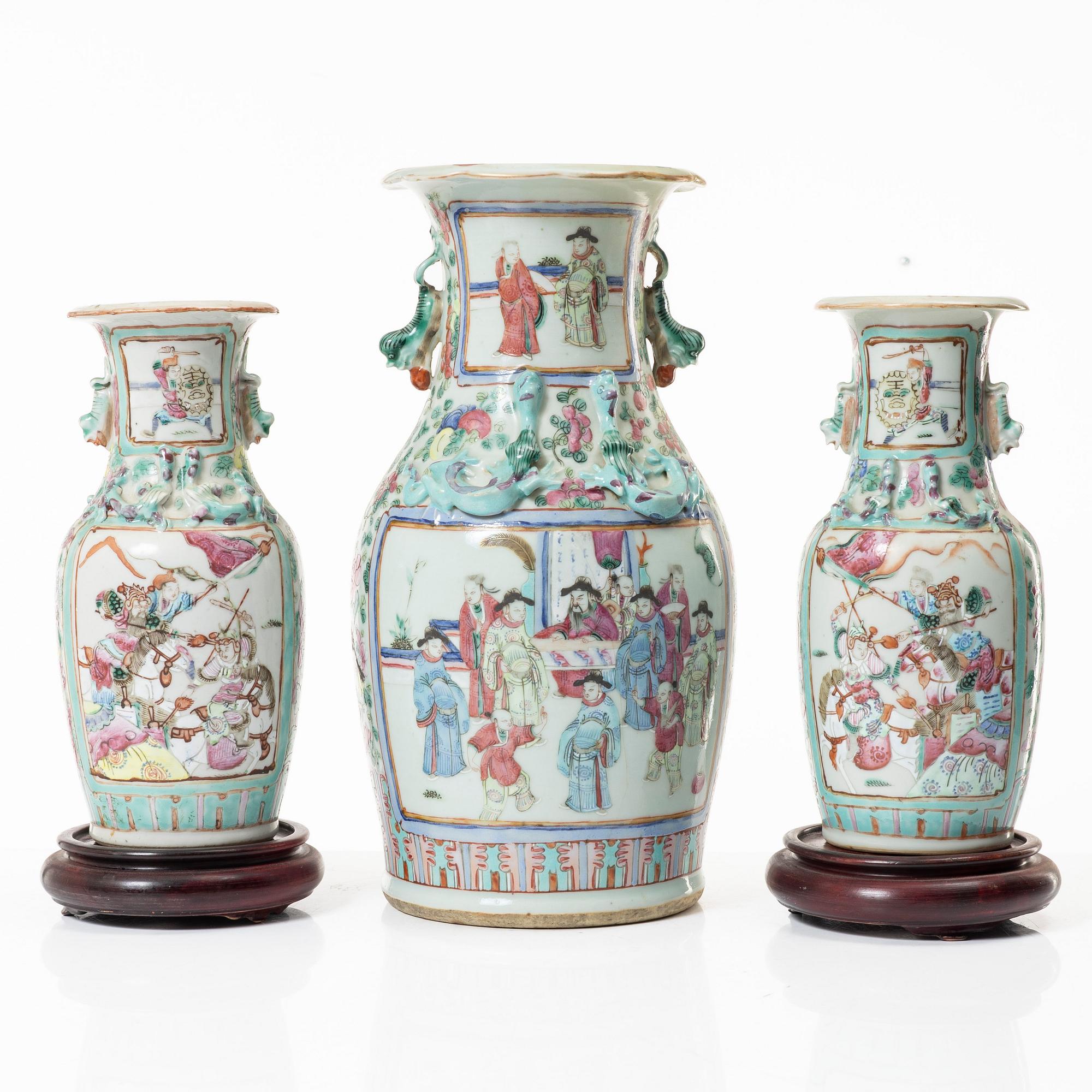 A group of three famille rose vases, Qing dynasty, late 19th century.