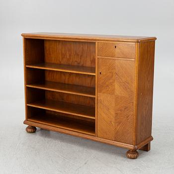 An oak bookcase, first half of the 20th century.