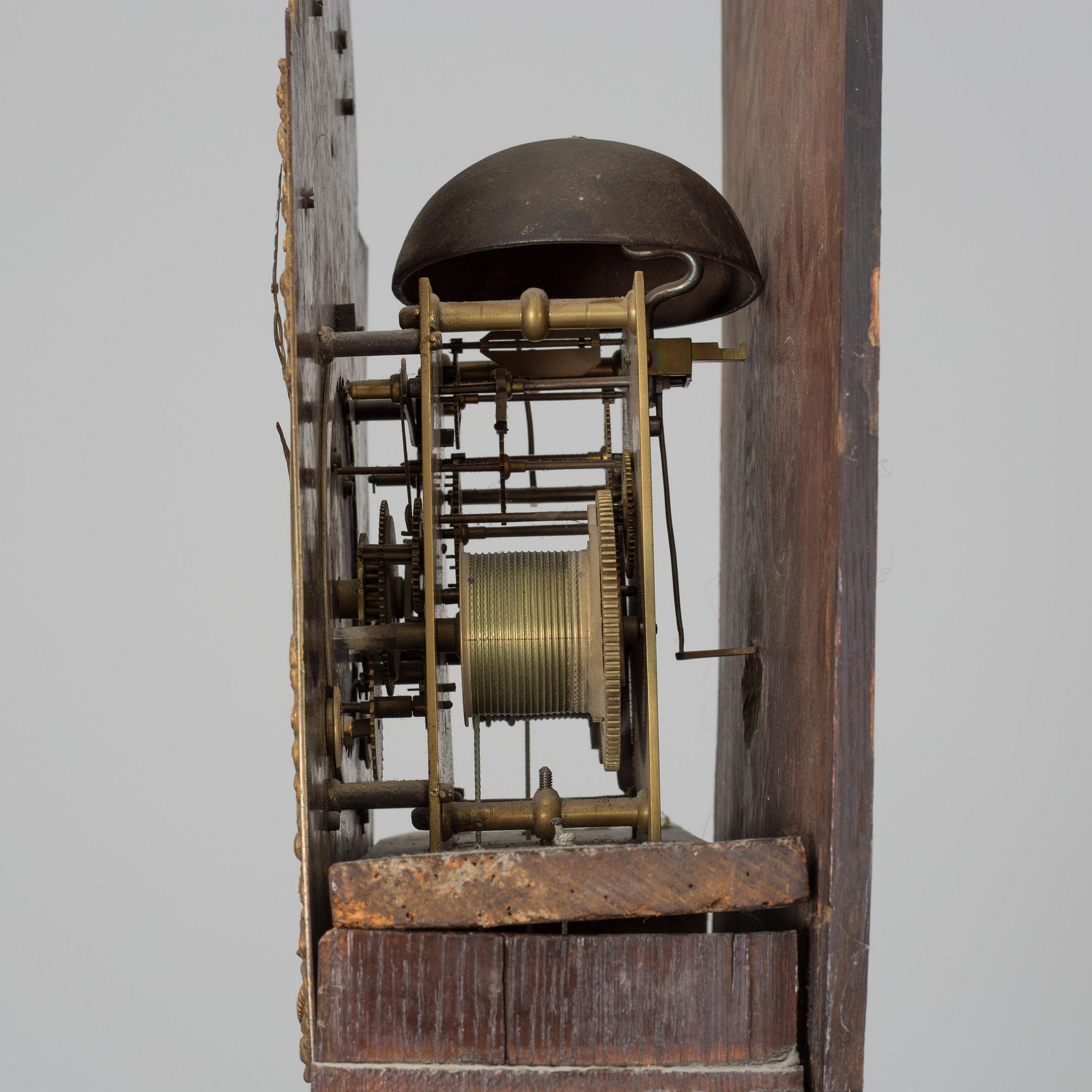 A WALNUT LONGCASE CLOCK, Benjamin Stretch, Bristol, 18th century.