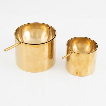 Arne Jacobsen, 2 brass ashtrays.