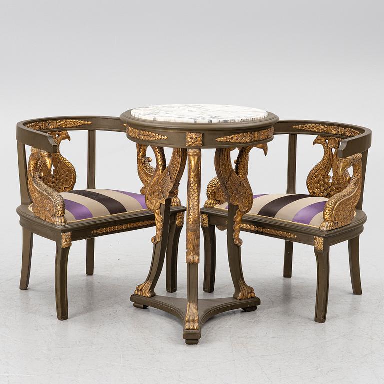A pair of Empire-style armchairs with an end table, second half of the 20th century.