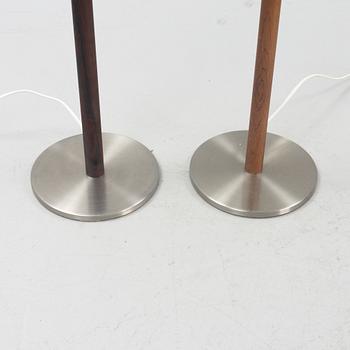 Uno & Östen Kristiansson, a pair of rosewood veneered floor lights, Luxus, Vittsjö, 1960's.