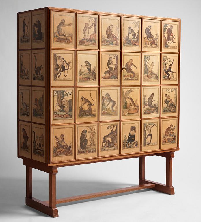 Josef Frank, 'Apskåpet' (The monkey cabinet), a rare cabinet covered with prints of different monkeys, Svenskt Tenn, Sweden ca 1941.