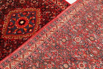 A Hosseinabad runner, ca 427 x 110 cm.