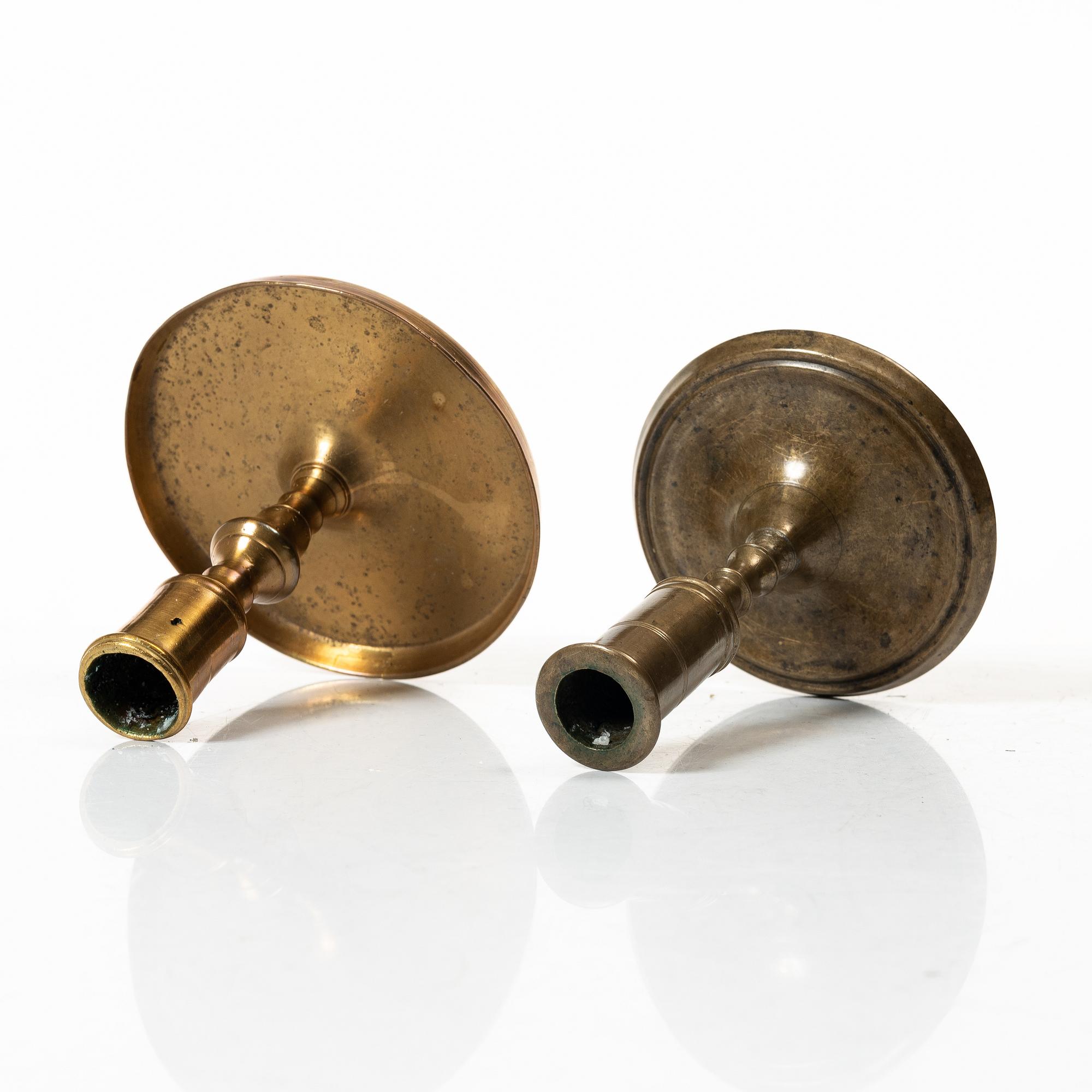 Candelabra, 4 pcs, and a chamberstick for two candles, brass, 19th century.