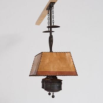 Nordiska Kompaniet, a patinated metal ceiling light for a Swedish "Sportstuge" interior, 1930's.