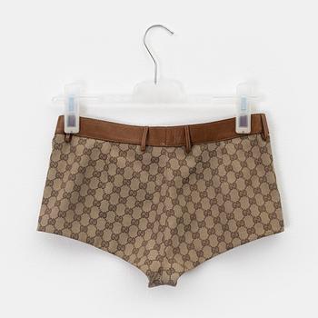 Gucci, a GG supreme jacket and shorts, size 38, 2000.