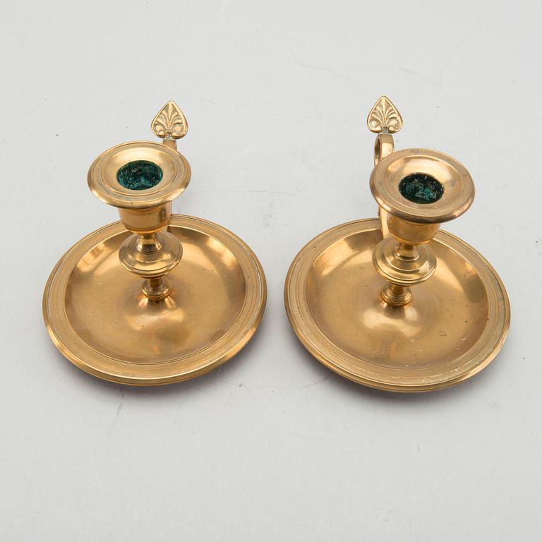 A pair of Gusum brass candelsticks.