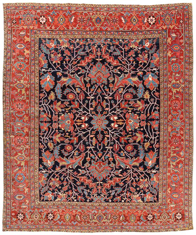 An antique Heriz Serapi, north west Persia, ca 421 x 352 cm.