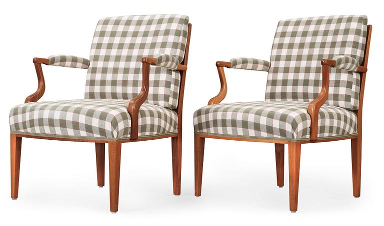 A pair of Josef Frank mahogany armchairs, Svenskt Tenn, model 969.