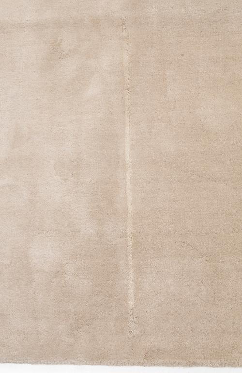 A hand tufted carpet, "Structured  Oatmeal", by lLayered ca 355 x 255 cm.