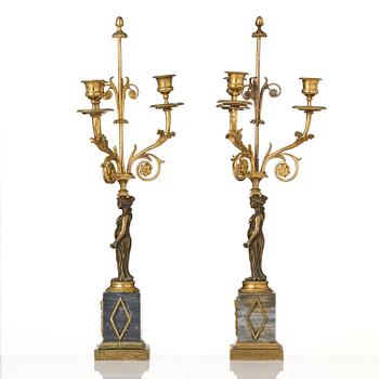 A pair of late Gustavian ormolu and marble three-light candelabra, Stockholm, late 18th century.