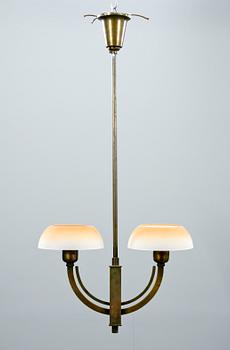 TAKLAMPA, brons, 1900-talets första årtionden. H 90.