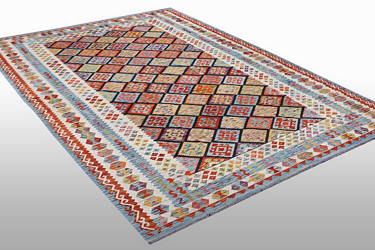A carpet, kilim 343 x 250 cm.
