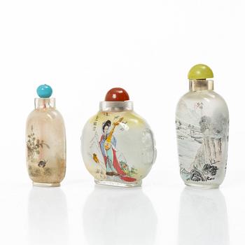 A group of three Chinese glass snuffbottles, 20th century.