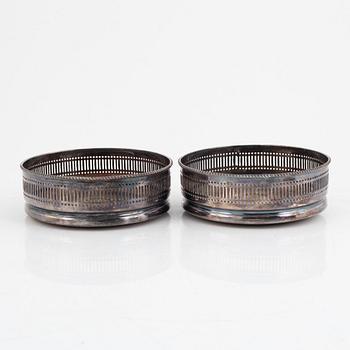 Two pairs of silverplate wine coasters, 20th century.