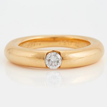 1016. Cartier ring "Ellipse" med en rund briljantslipad diamant 0.25 ct enligt gravyr.