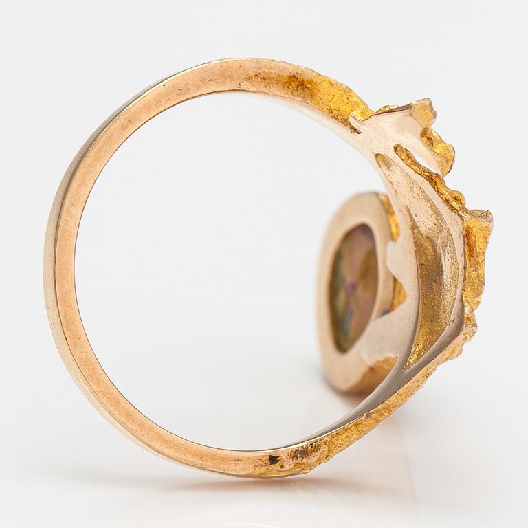 "Pond in the forest", A 14K gold ring with a tourmaline. Lapponia 1971.