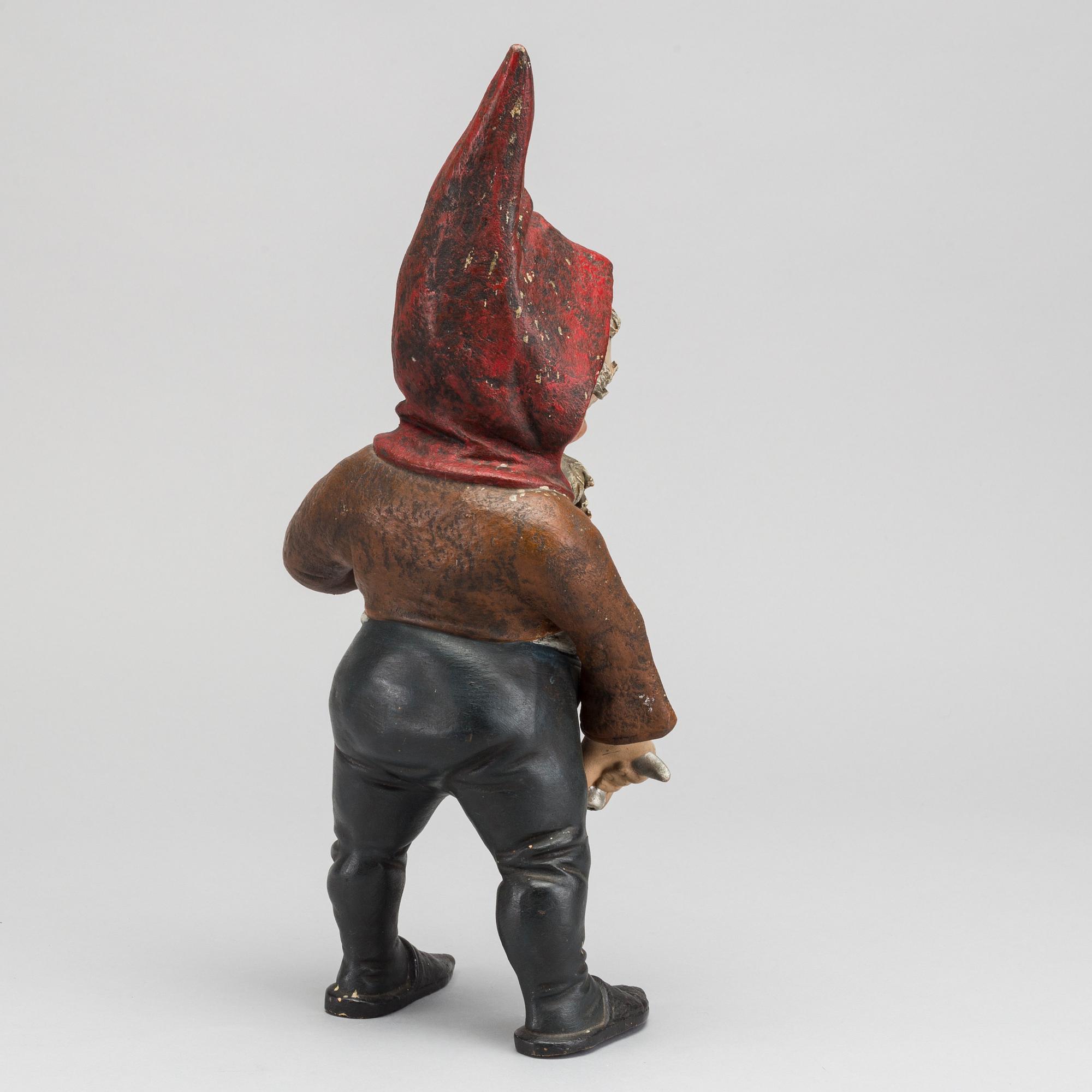 A painted terracotta gnome early 1900's.