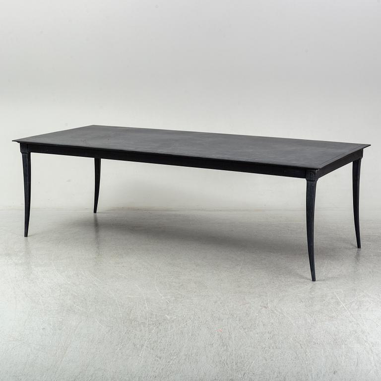 A metal Restoration Hardwood table, 21st Century.