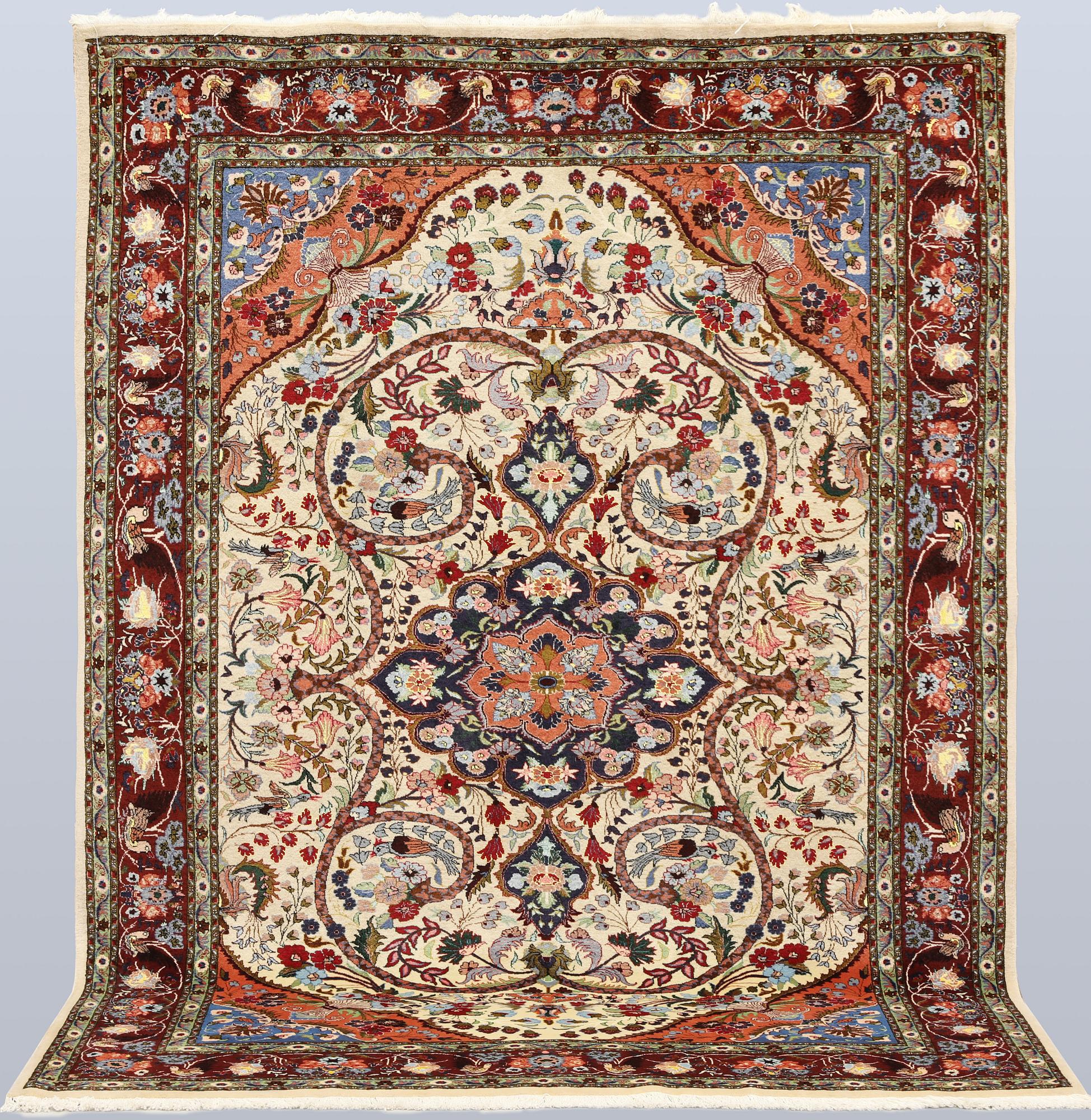 A part silk Tabriz rug, so-called 50 Raj, approx. 242 x 178 cm.