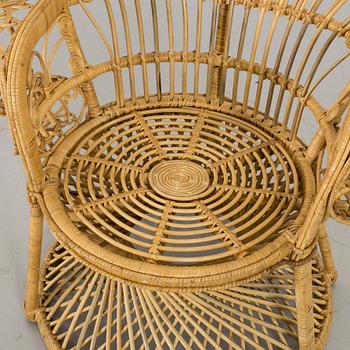 A 20th century wicker chair.