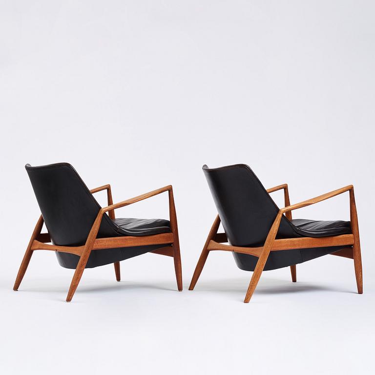 Ib Kofod-Larsen, a pair of black leather 'Sälen' easy chairs, Olof Perssons Fåtöljindustri (OPE), Sweden 1950s-60s.