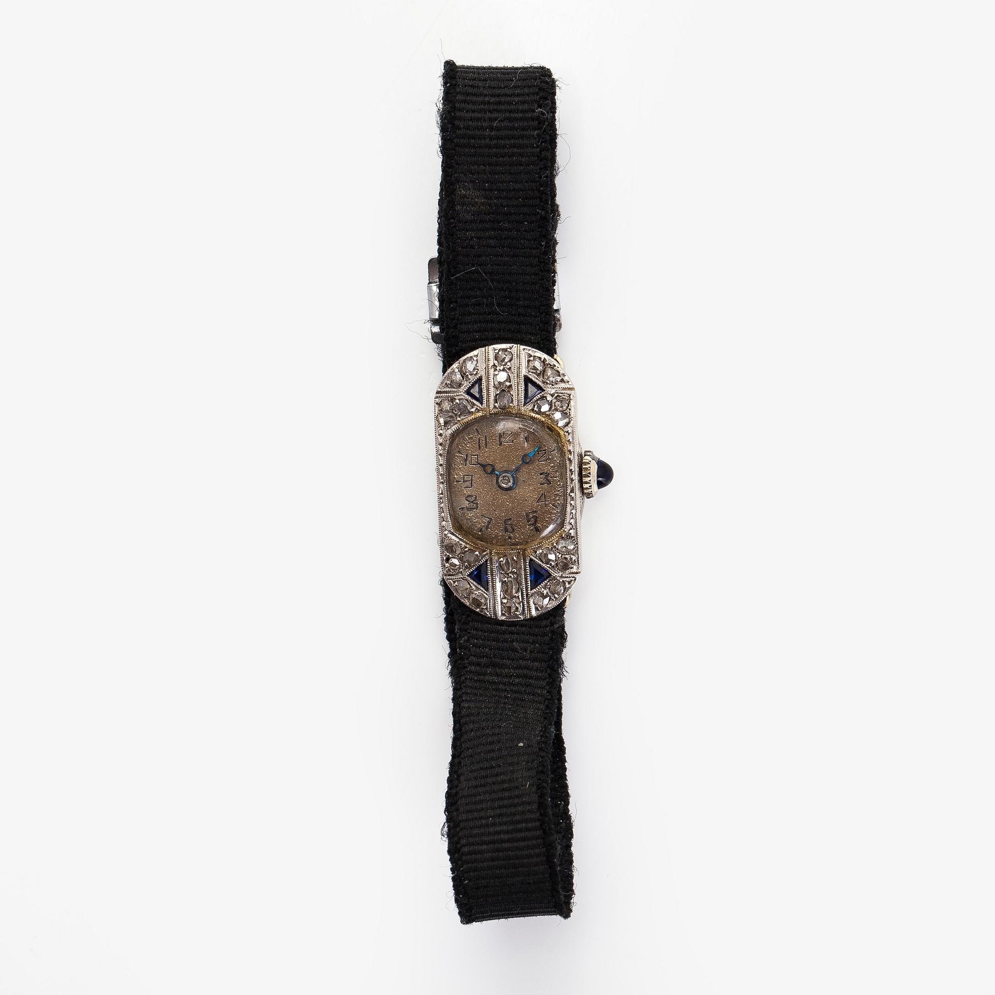 Wristwatch, 25 x 13 mm, Art Deco, rose cut diamonds, faceted sapphires, 18K white gold.