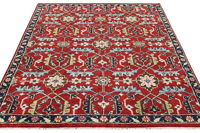 An oriental carpet, c. 301 x 239 cm.