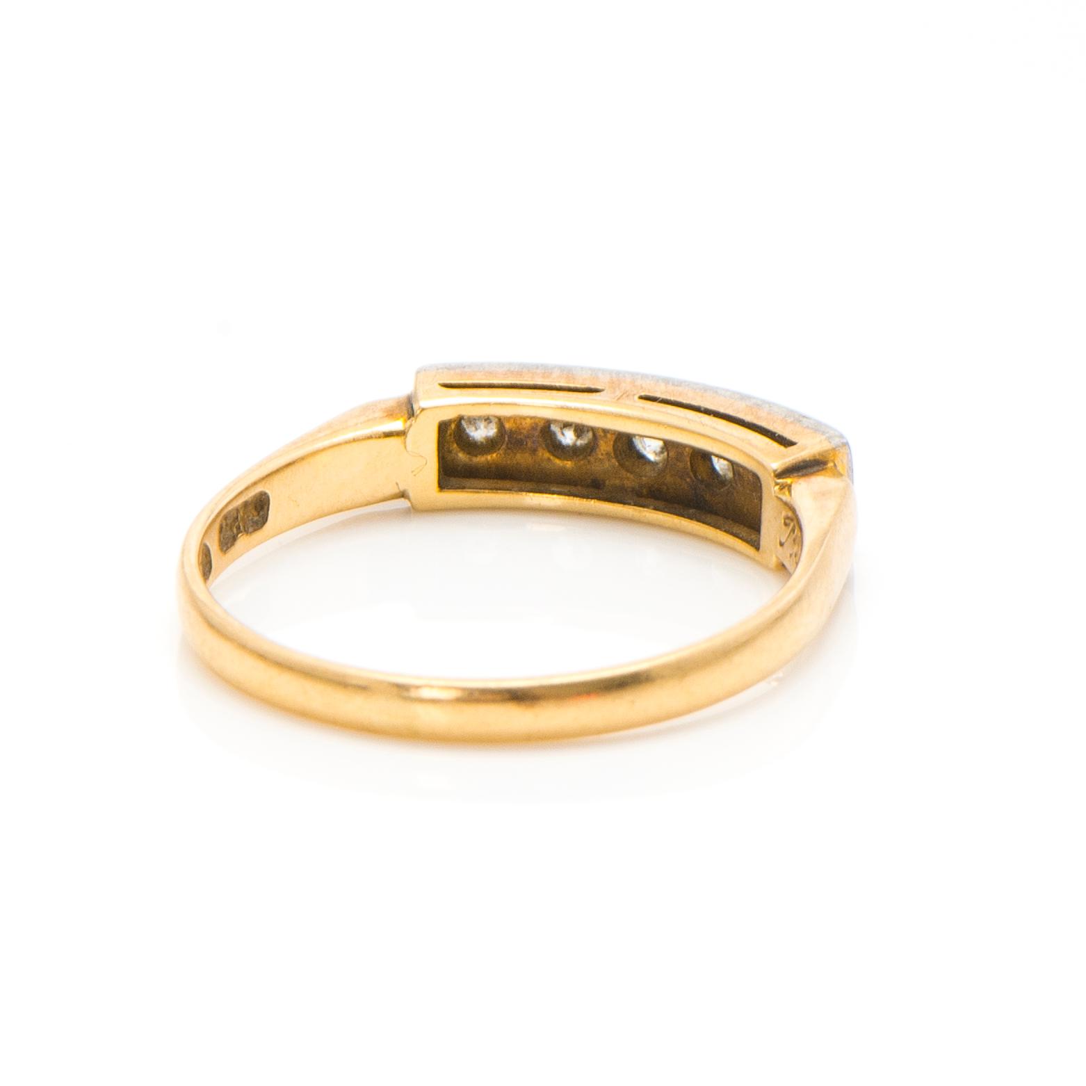 An 18K gold ring with diamonds ca. 0.22 ct in total. Päiviö Veikko, Turku 1955.