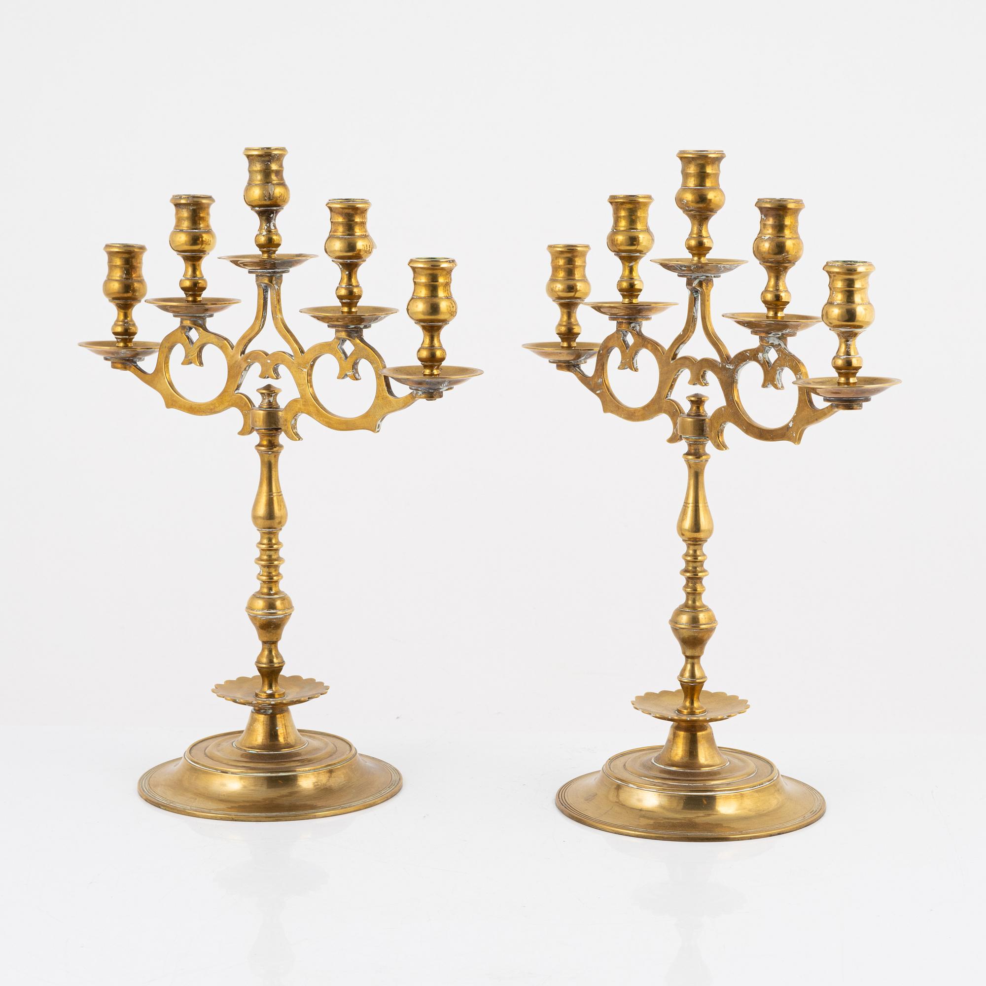 A pair of brass candelabras, early 20th century.