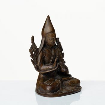 A Nepalese copper alloy figure of Tsongkapa, 20th Century.