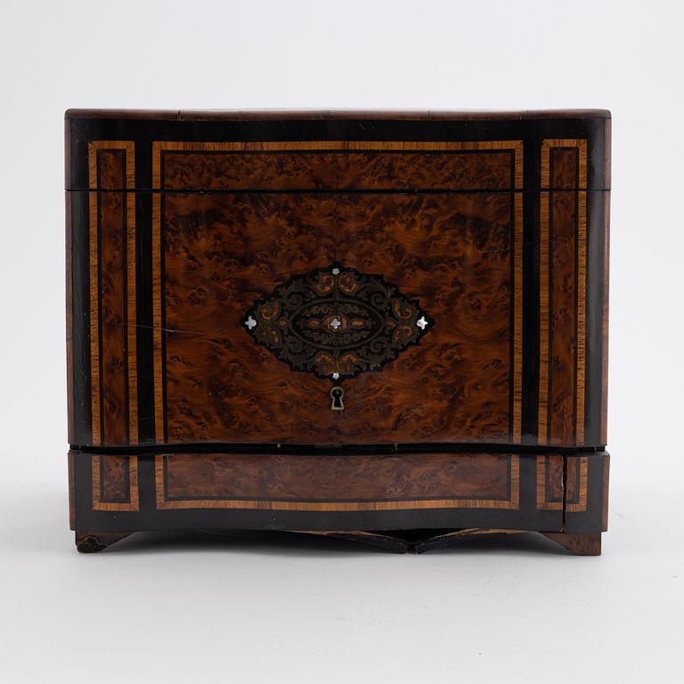 A French burr-walnut veneered tantalus, late 19th Century.