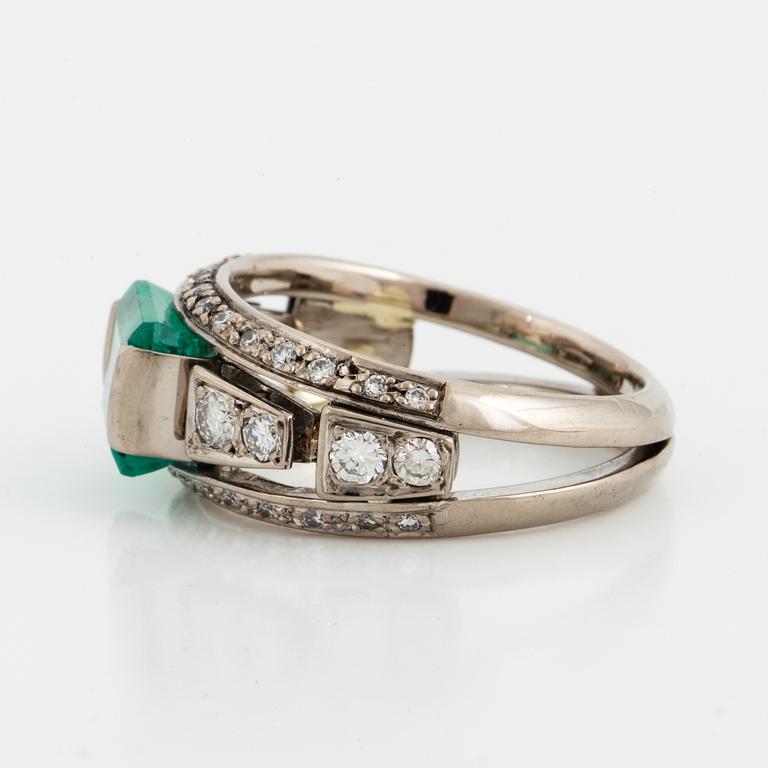 A Mandelstam emerald and diamond ring.