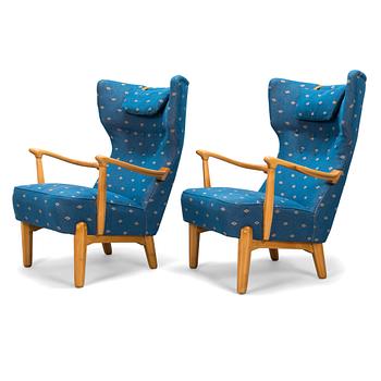 Lasse Ollinkari, a pair of 1947 designed armchairs manufactured by Vallilan Puuseppä Ltd.