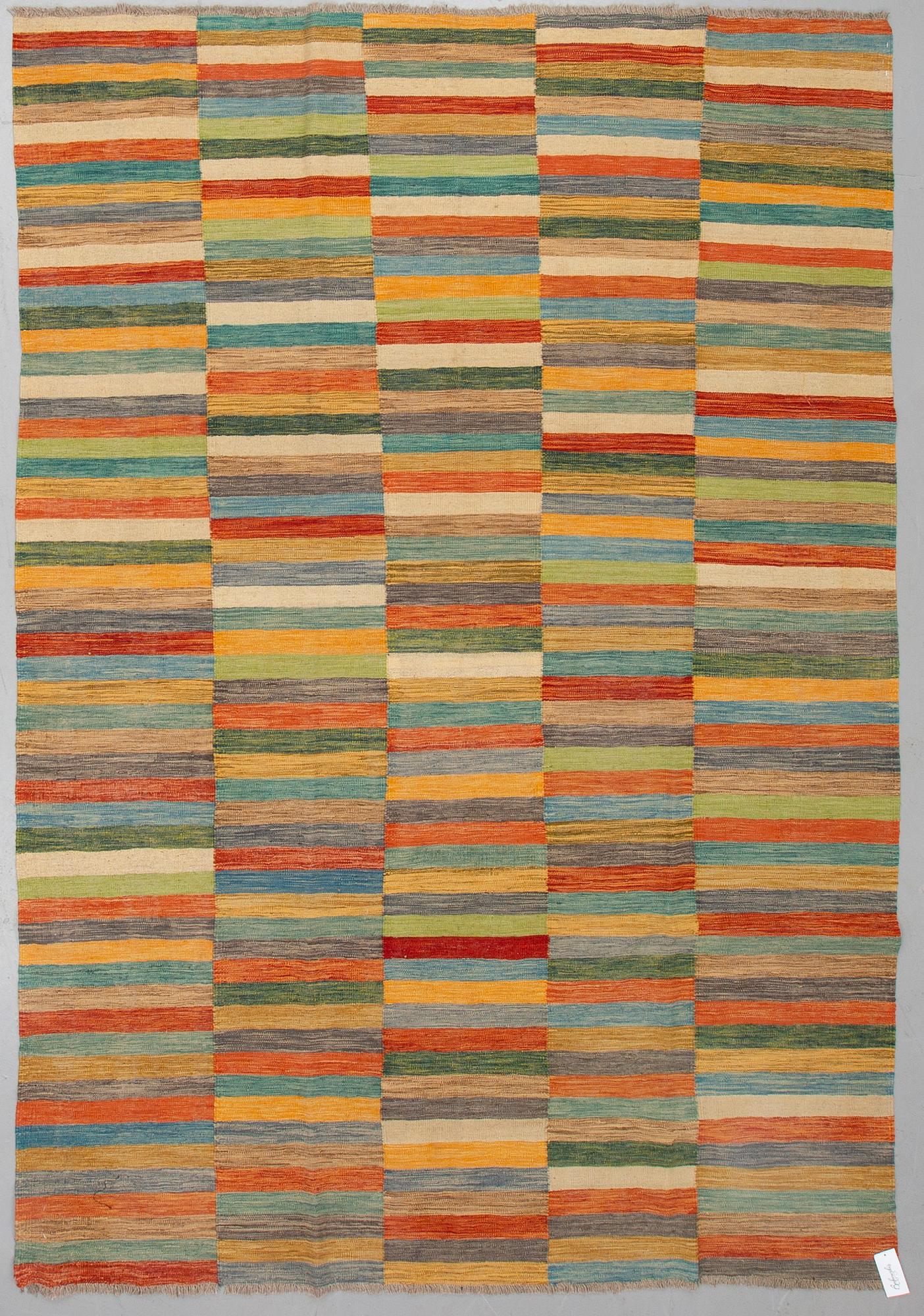 A CARPET, kilim, ca 291 x 199 cm.