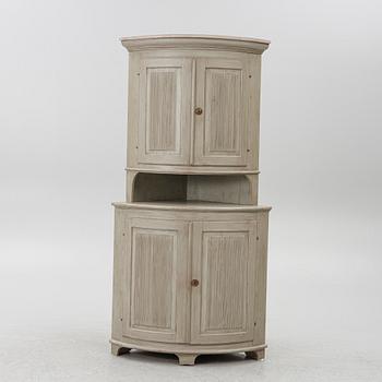 A Gustavian style corner cabinet, second half of the 20th Century.