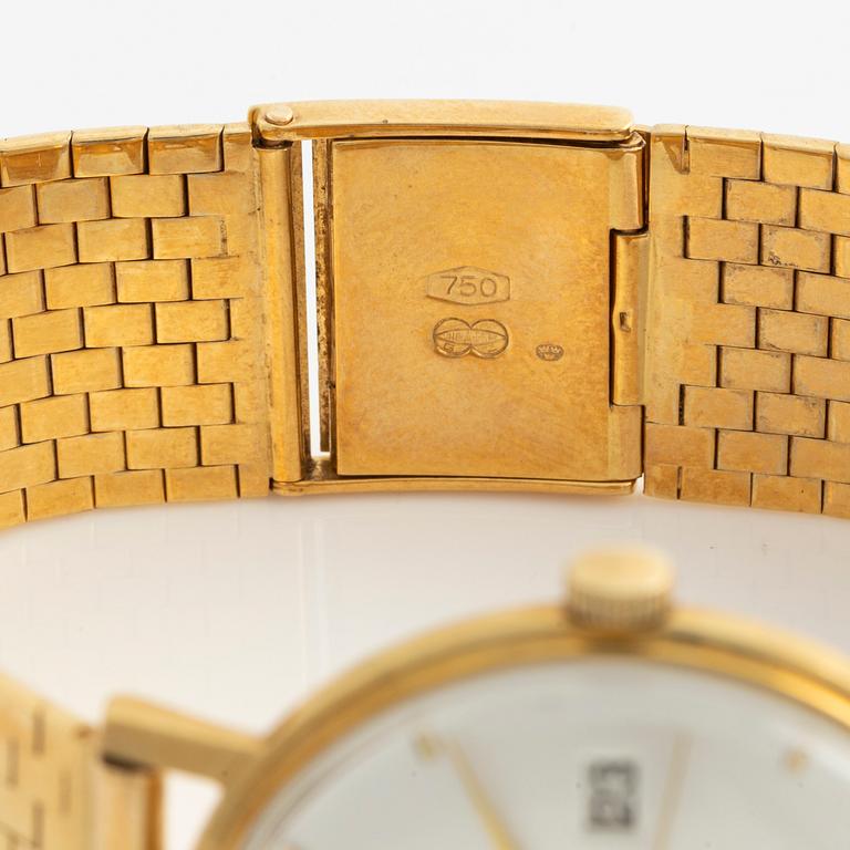 Deco, 18k wristwatch with bracelet in 18K gold, 34 mm.