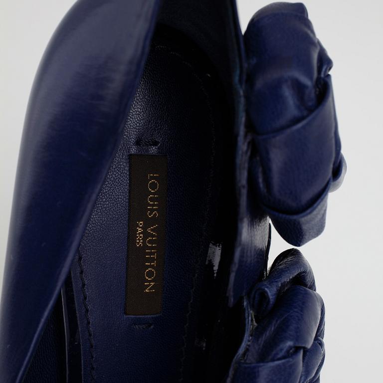 LOUIS VUITTON, a pair of purple leather lady's shoes.
