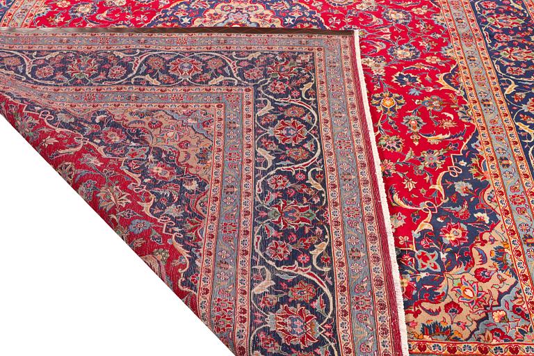 A Keshan carpet, c. 408 x 295 cm.